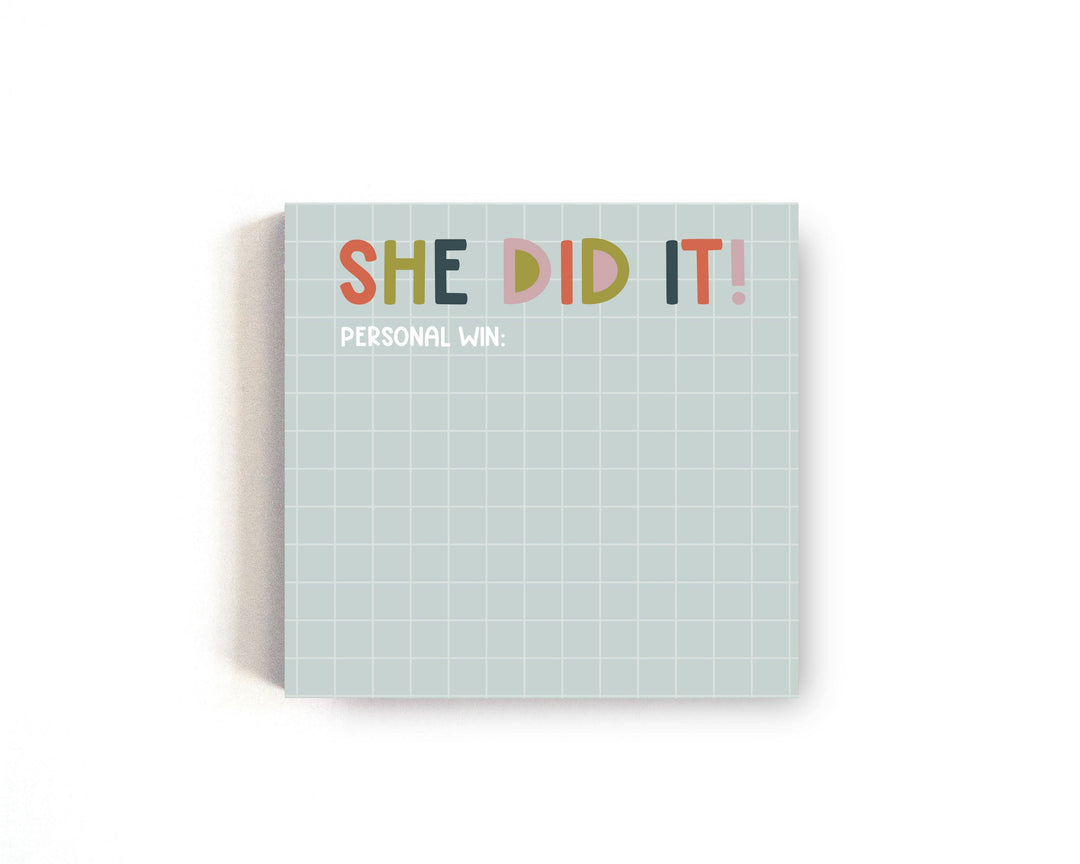 Hand lettered text at top of pad on light green graph paper background.