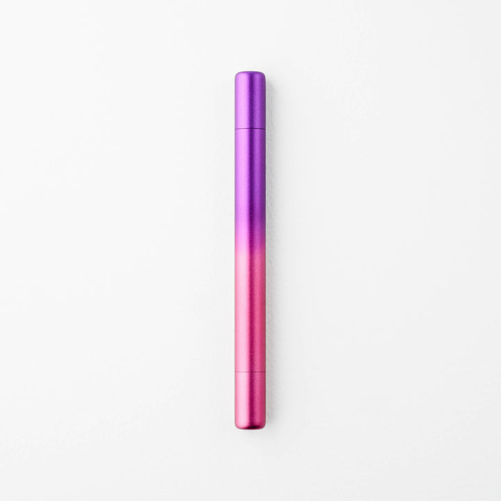 Gradient purple to pink pen with caps on either end.