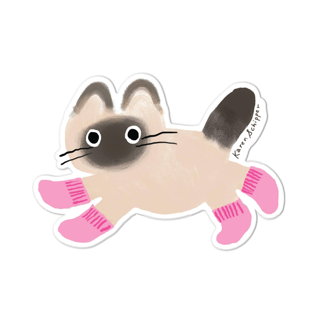 A die-cut sticker featuring a cute cartoon cat with a beige body, dark brown face and tail, and pink paws.