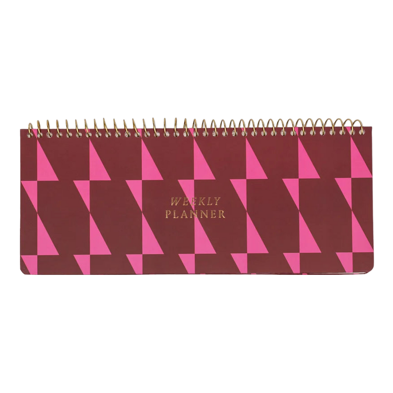 Planner with a light and dark pink geometric pattern, labeled 'Weekly Planner' with wire-o binding across the top.