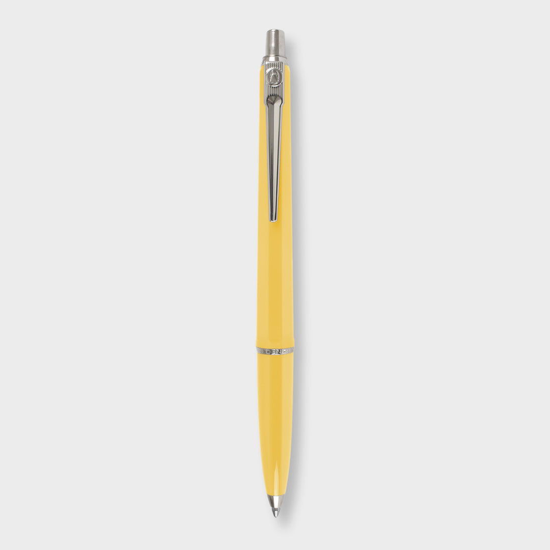 Yellow pen with silver clip.