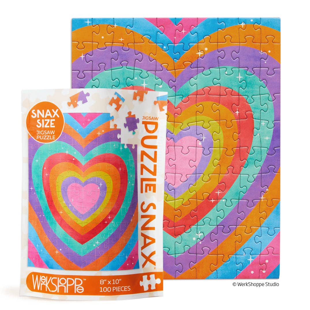 Snax pouch in front of completed puzzle of concentric hearts in bright colors.
