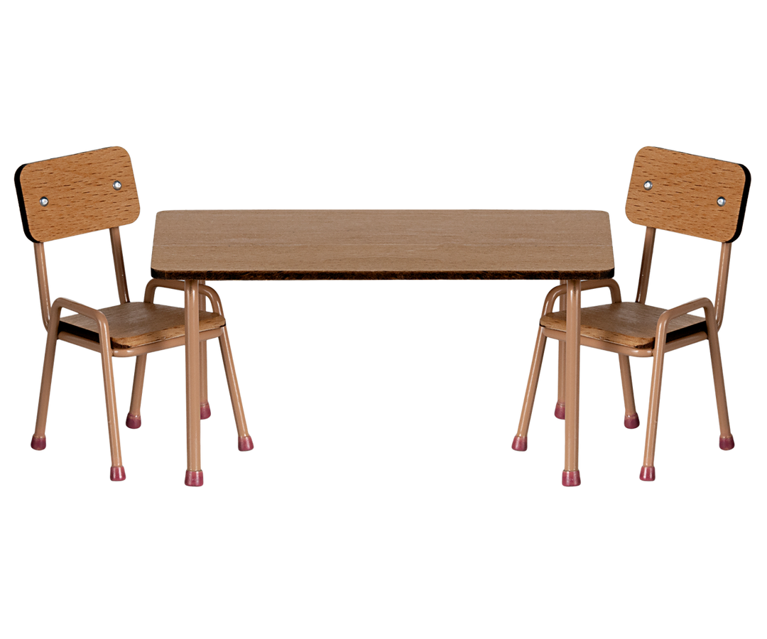 Table and two chairs with wood tops and seats, and metal legs.