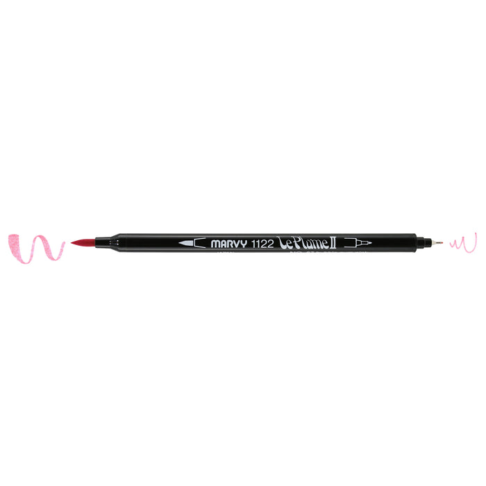 Bubble gum pink LePlume II pen oriented horizontally with caps removed to show the weight of each stroke: heavy on the left and light on the right.