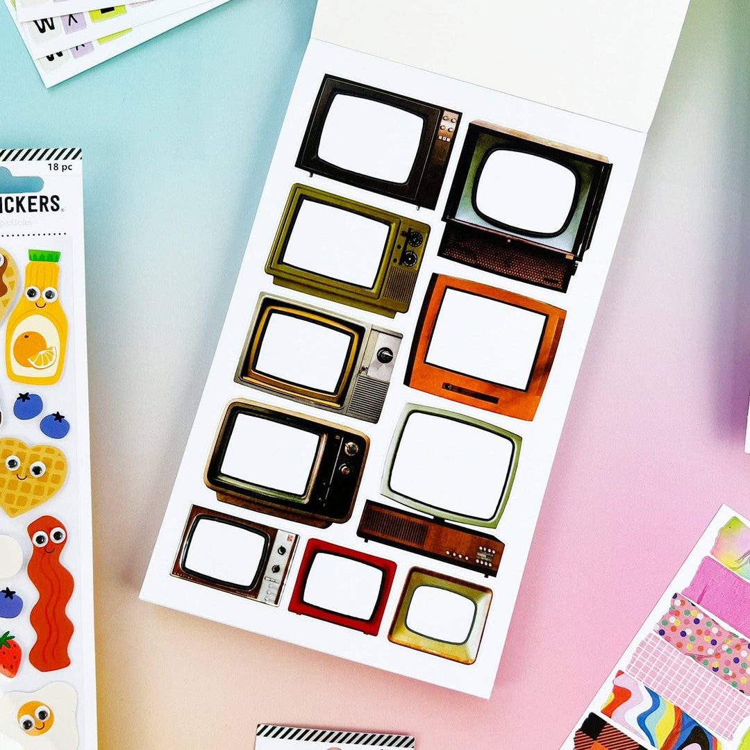 Page of sticker book with 11 television sets of different designs with blank screens.