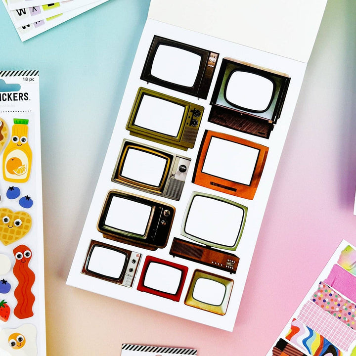 Page of sticker book with 11 television sets of different designs with blank screens.