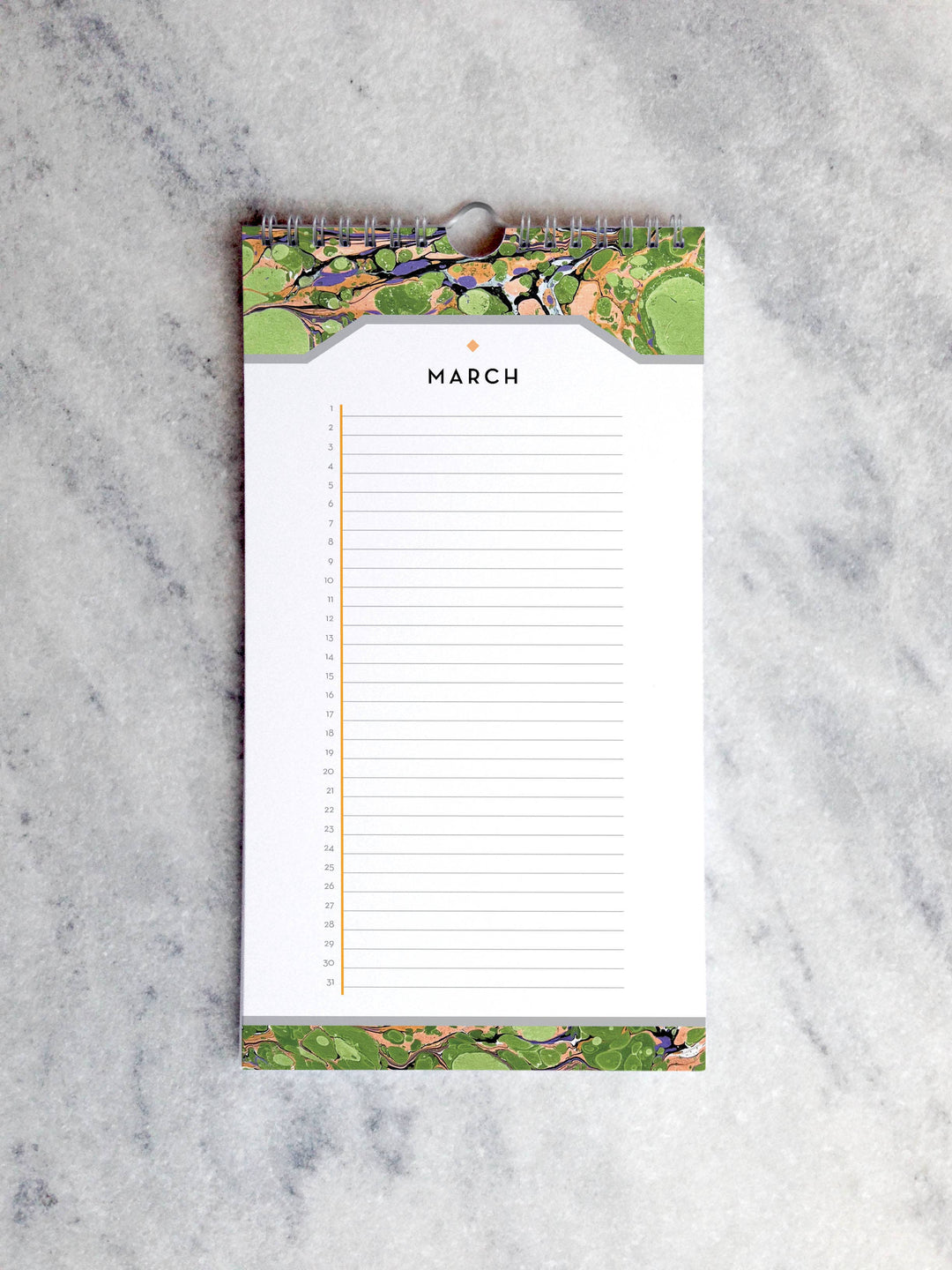 Page for March with marbled paper in shades of green at the top and bottom. Below the month title is a line for each day of the month.
