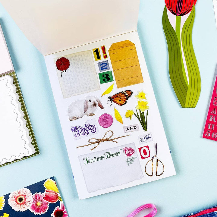 Sheet of decorative stickers including a rabbit, butterfly, numbers, scissors and more.