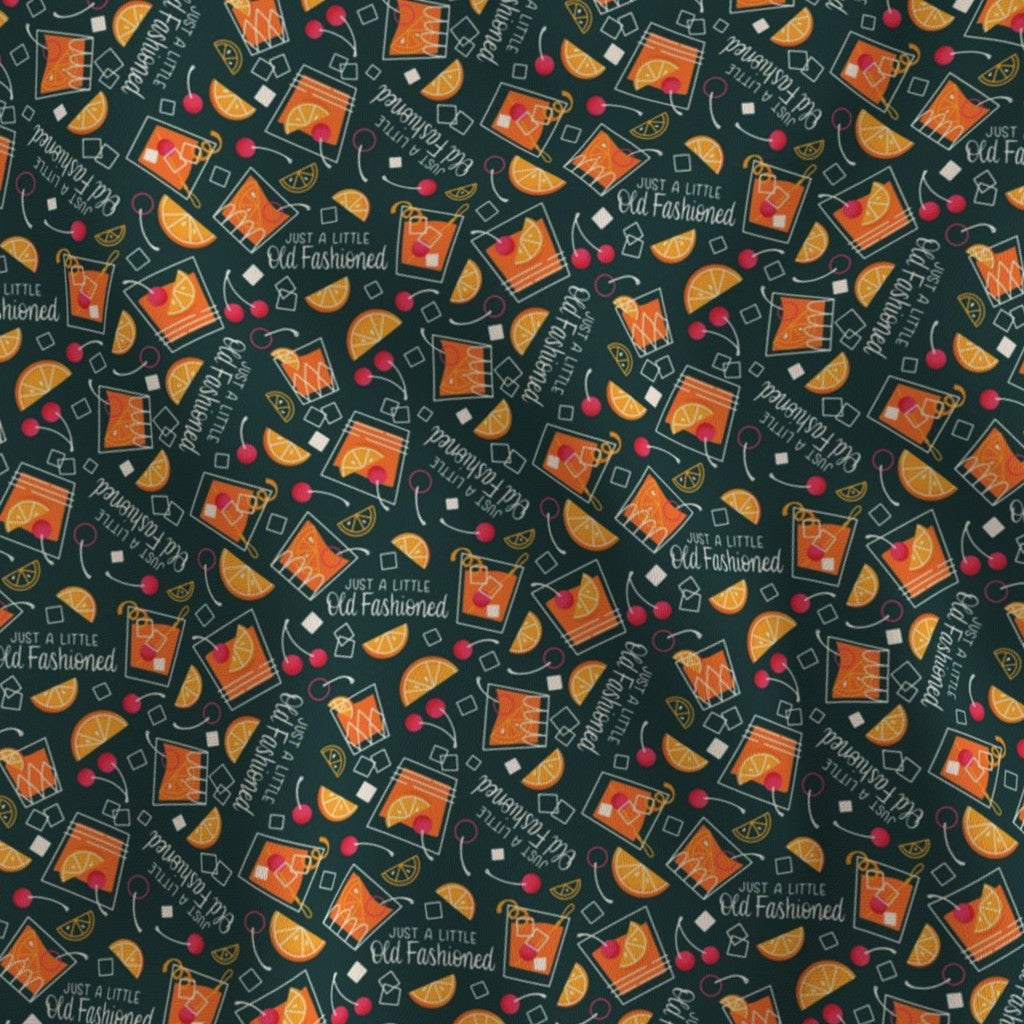 Pattern of Old Fashioned glasses, orange wedges, and text 'just a little old fashioned' on a dark green background.