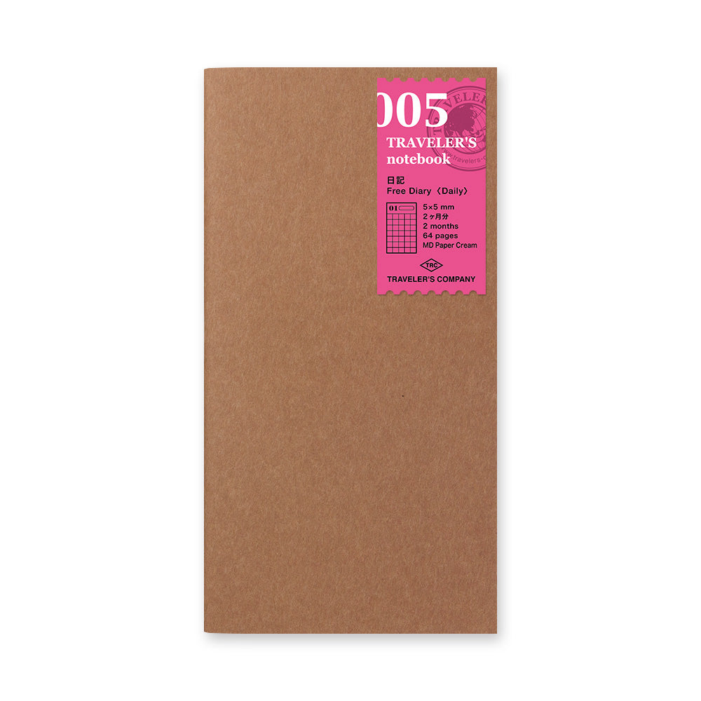 Regular-size Traveler's 005 undated daily diary, on a kraft background pink label.