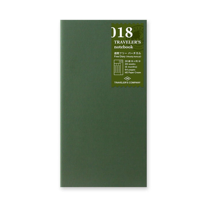 Regular-size 018 Traveler's undated weekly diary with green cover and olive green label.