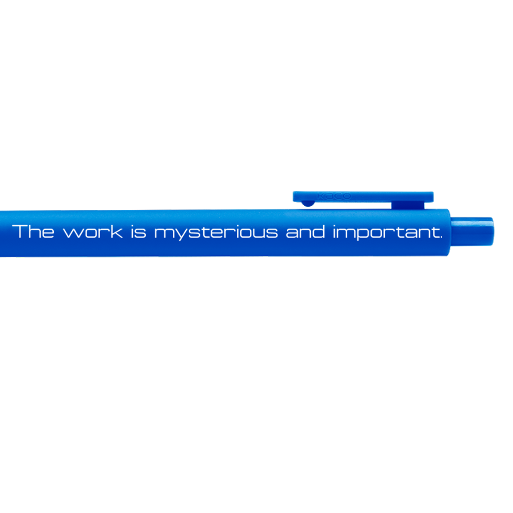 Blue gel pen with clip and clicker and white text in the Lumon Industries font.
