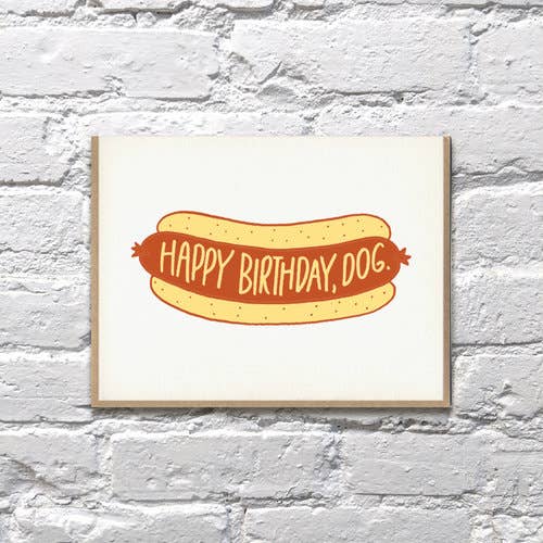 Hot dog graphic in bun and 'Happy Birthday, Dog' text on the hot dog.