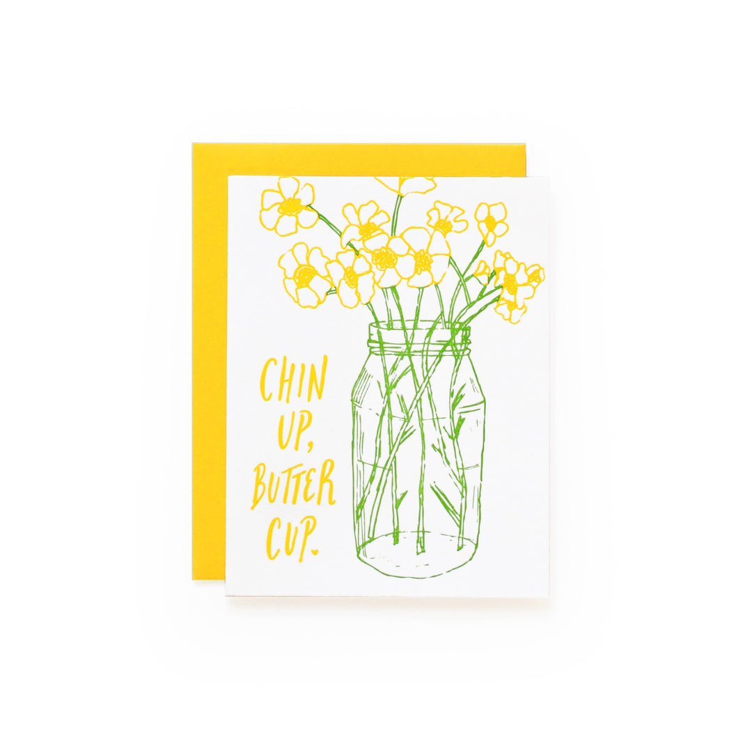 Yellow flowers in a clear Mason jar outlined in green with yellow hand written text on white card stock.