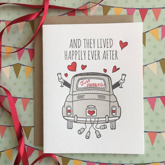 Hand drawn car with an arm out each front window holding champagne classes with tin cans tied to the trunk. Gray text and red hearts on a white card stock