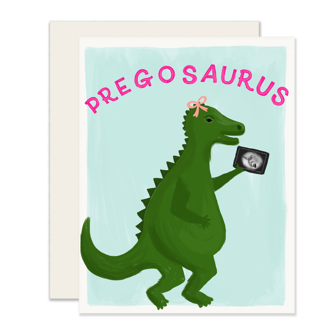 Green dinosaur holding an ultrasound image on a light blue background. Pink letters spell "pregosaurus" at the top.