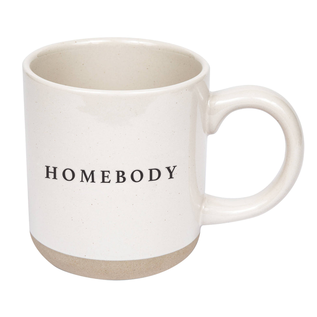 Stoneware mug with off white glaze and text in black; 1" natural, unglazed section at bottom.