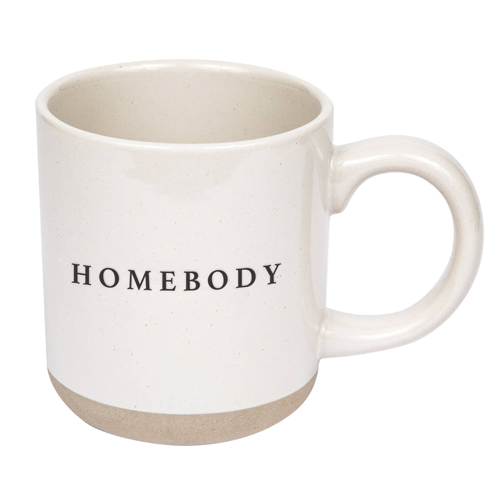 Stoneware mug with off white glaze and text in black; 1" natural, unglazed section at bottom.