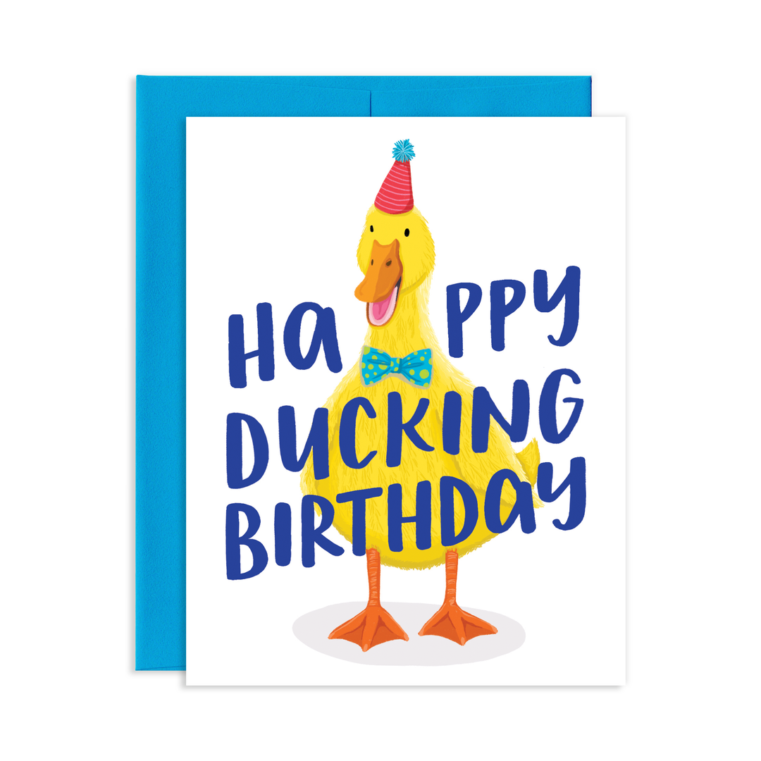 Front of card with large yellow duck wearing a party hat and turquoise and yellow bow tie, with the text 'Happy Ducking Birthday.'