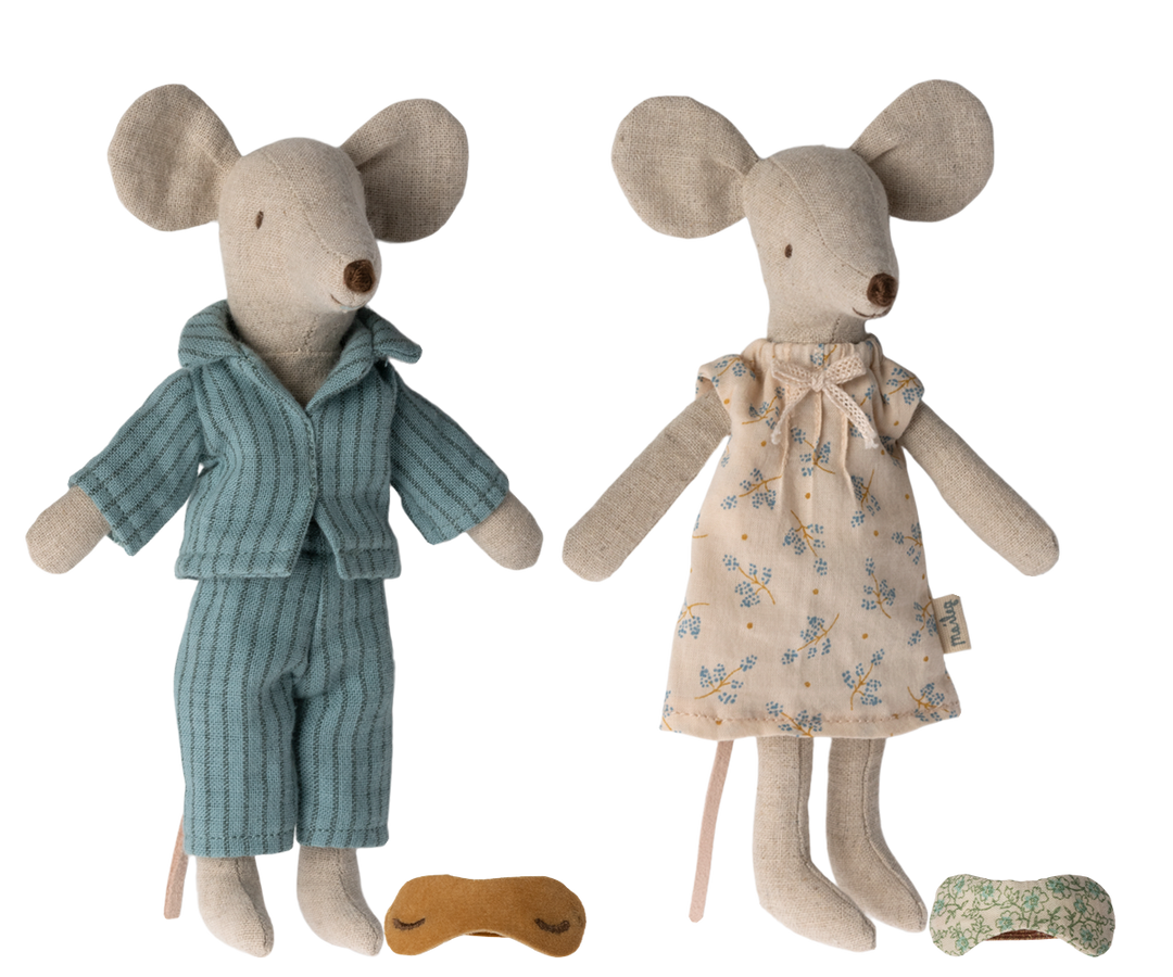 Mum mouse wearing an off-white nightgown with flower pattern next to Dad mouse, wearing blue striped pajamas with their eye shades at their feet