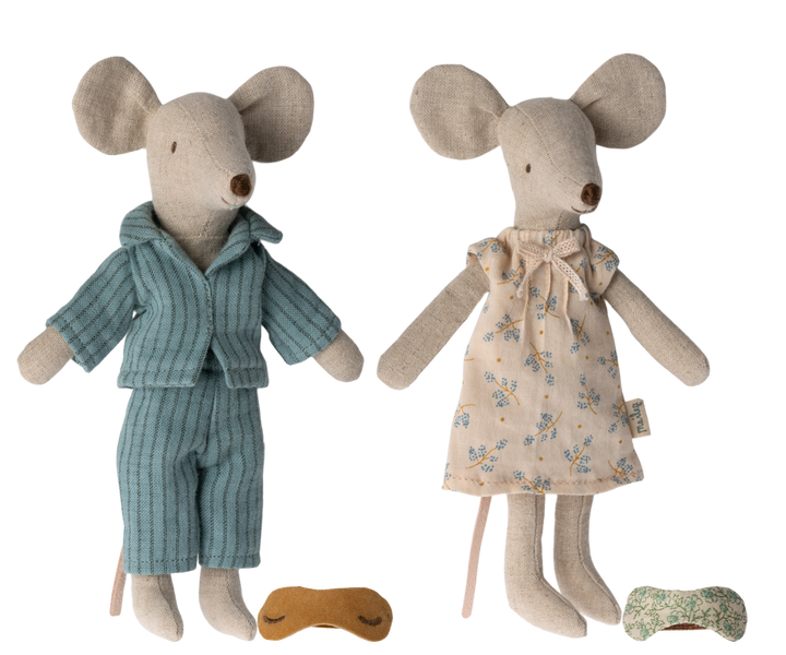 Mum mouse wearing an off-white nightgown with flower pattern next to Dad mouse, wearing blue striped pajamas with their eye shades at their feet