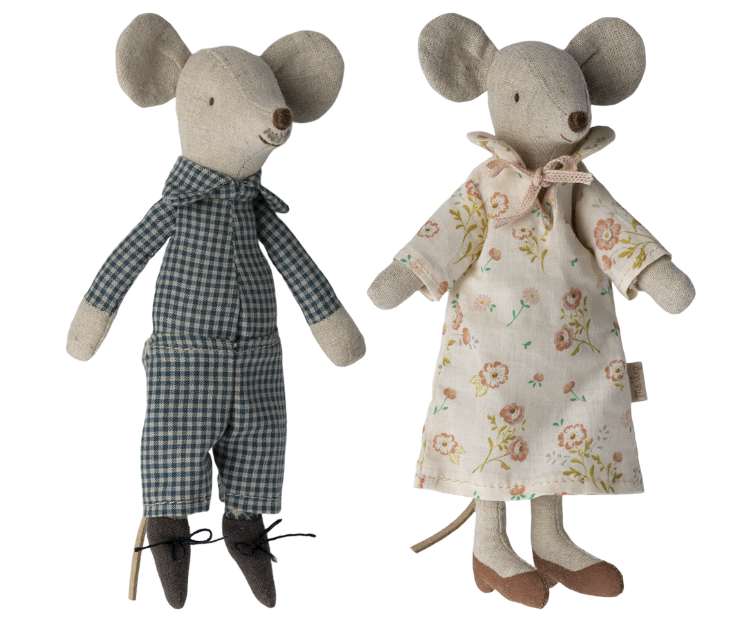 Grandma mouse wearing an off-white nightgown with flower pattern next to Grandpa mouse, wearing a checked pajamas.