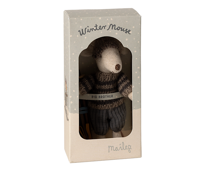Mouse dressed in brown and tan winter clothing in box labeled Winter Mouse, Big Brother.