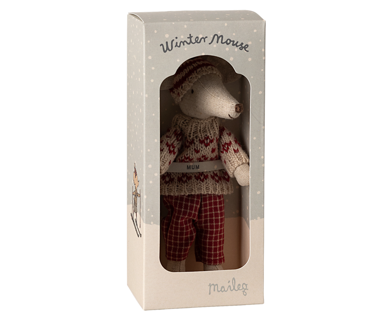 Mouse dressed in red and beige winter clothing in box labeled "Winter Mouse Mum."