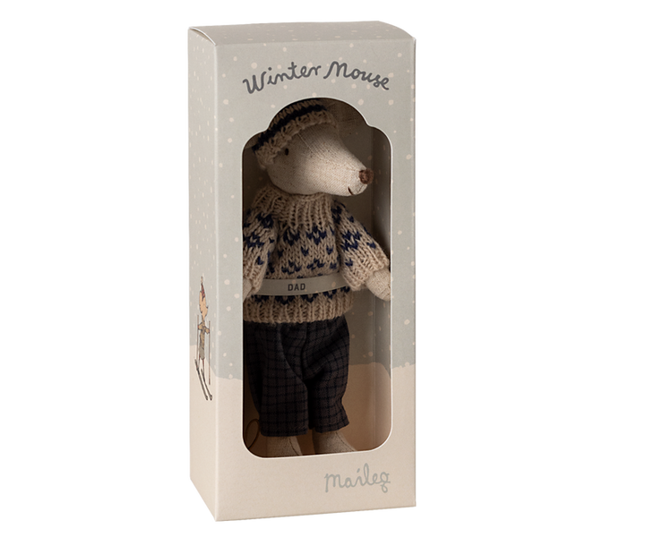 Mouse dressed in dark gray and beige winter clothing in box labeled "Winter Mouse Dad."