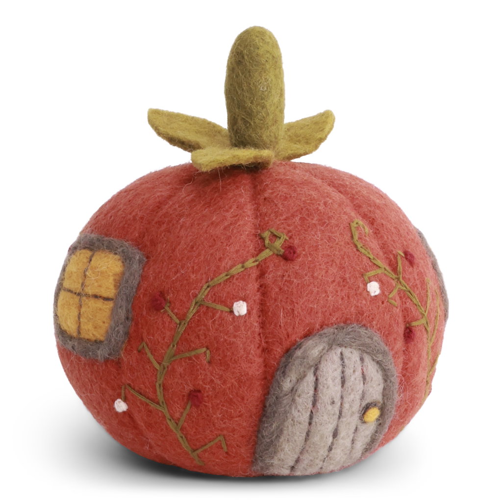 A felt pumpkin-shaped decorative house with a rusty red body, olive green stem, embroidered green vines, a gray door, and a yellow window.