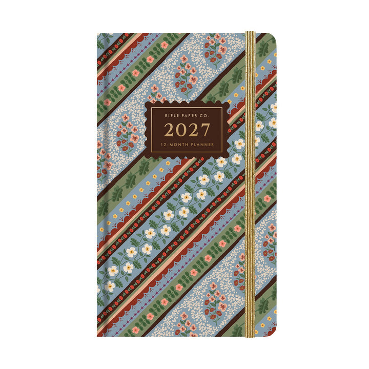 Cover of 2027 pocket planner with softly colorful diagonal pattern in blues and greens.