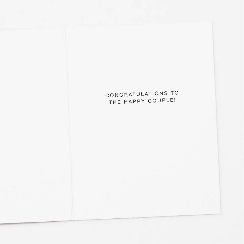 Interior of greeting card with the text congratulations to the happy couple!