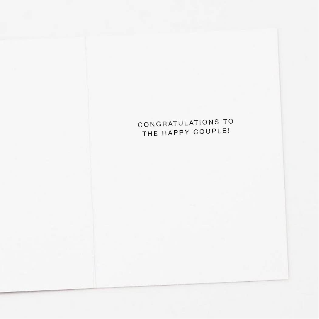 Interior of greeting card with the text congratulations to the happy couple!