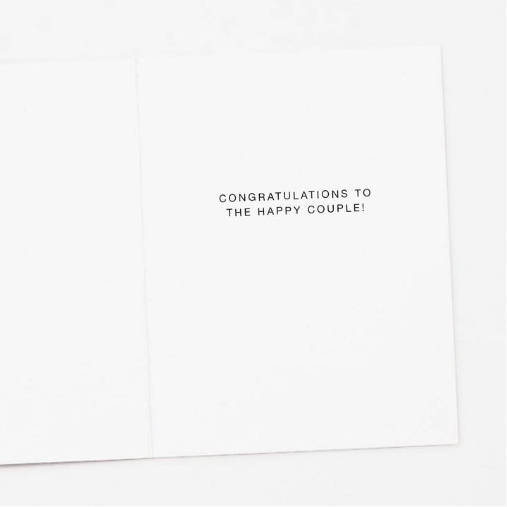 Interior of greeting card with the text congratulations to the happy couple!