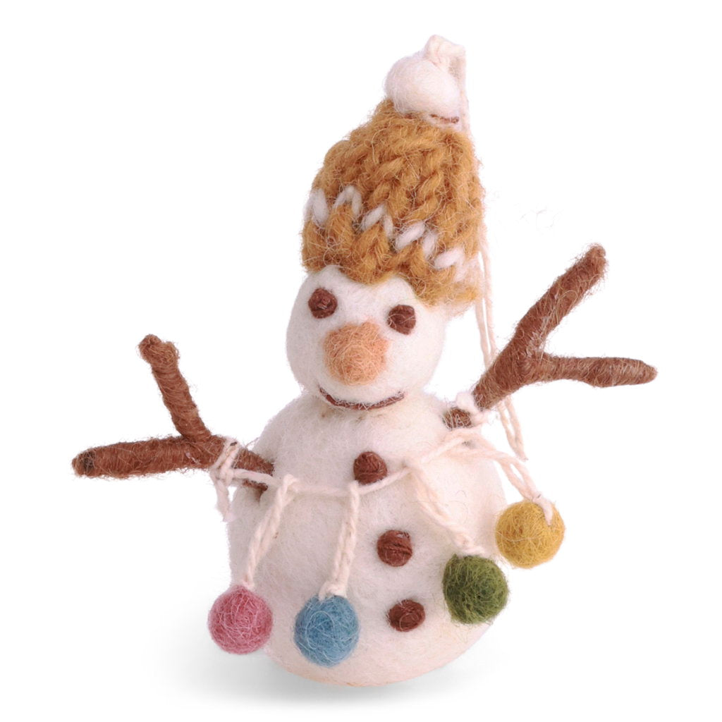 A handmade felt snowman with a yellow knit hat, twig arms, and colorful wool ball garlands.
