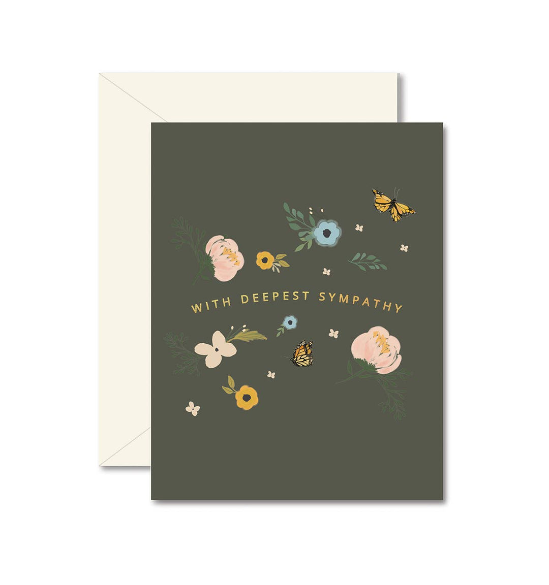 Butterflies and flowers surround golden text on dark green background