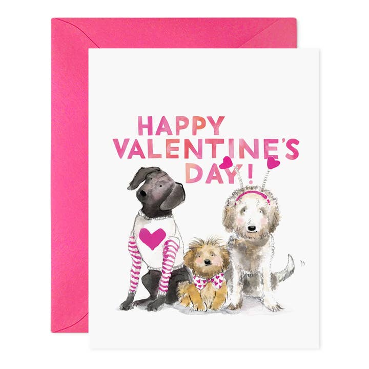 Front of card with three different types of dogs, dressed in valentine accessories, under the text 'Happy Valentine's Day!'
