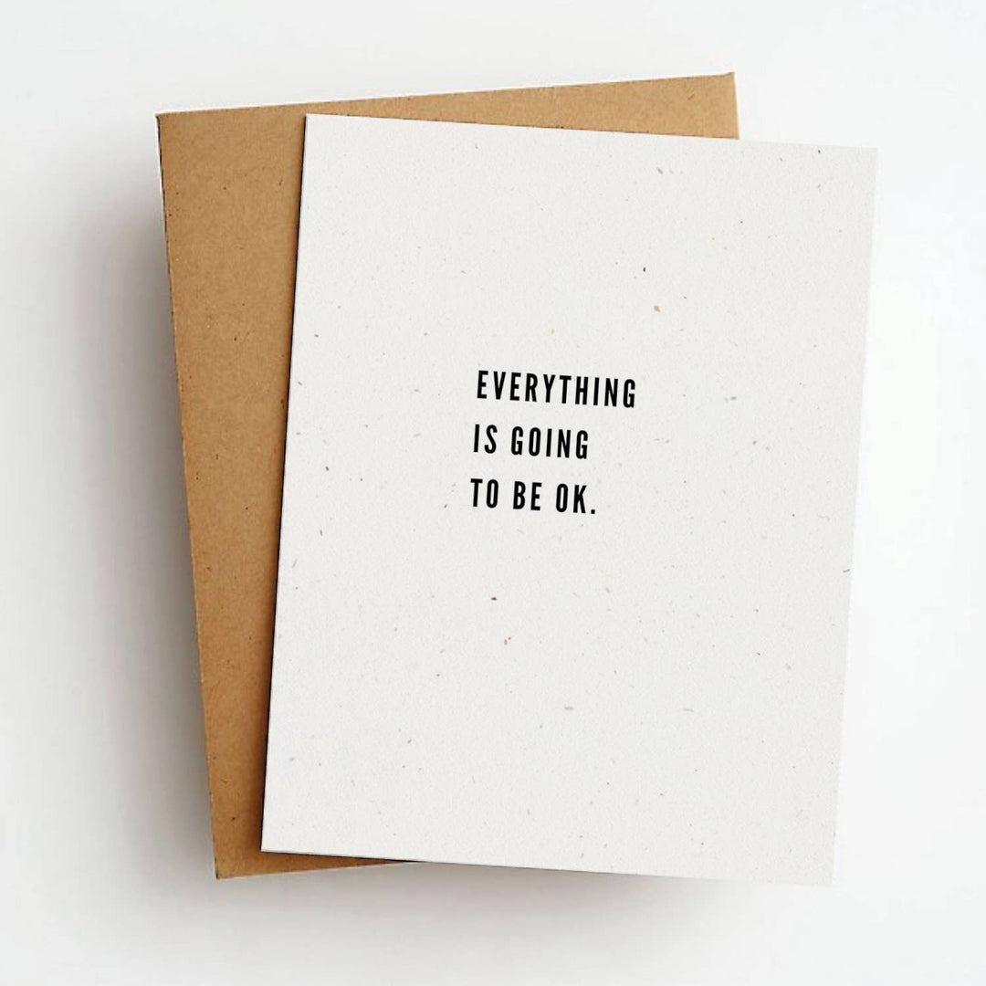 Front of greeting card with 'Everything is going to be OK.' text in black on a white background