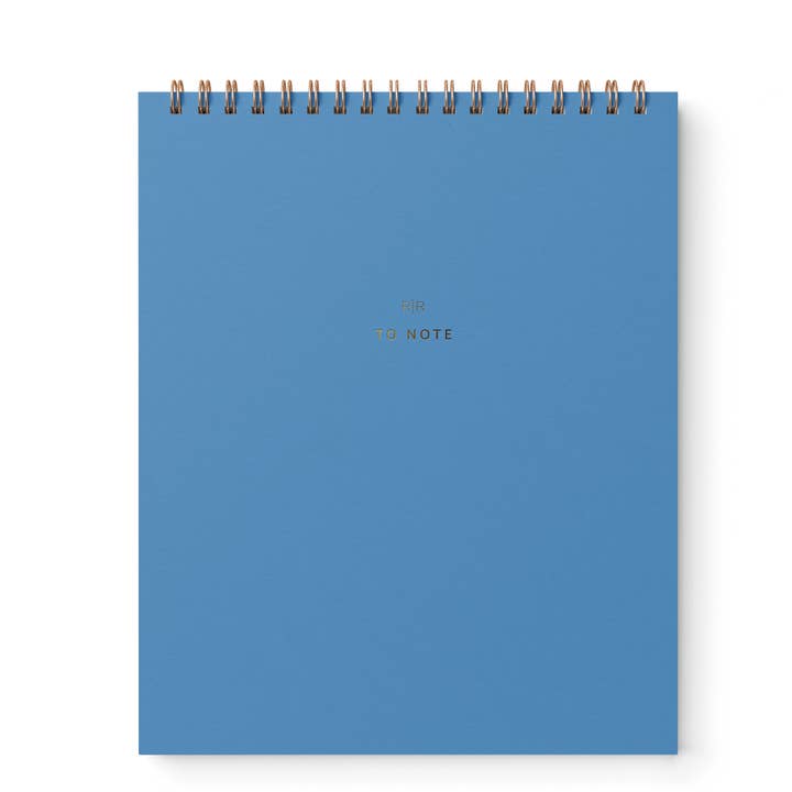 Cover of notebook in Mediterranean blue with gold wire binding at top.