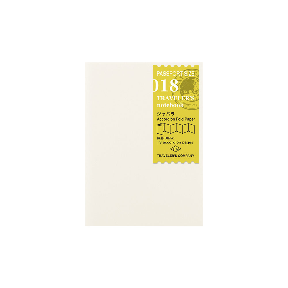 Passport-sized 018 accordion folded paper, with a yellow label.