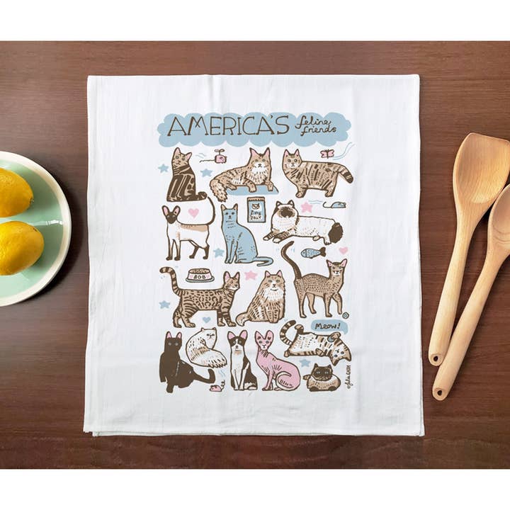 100% cotton kitchen towel with a variety of hand drawn cats.