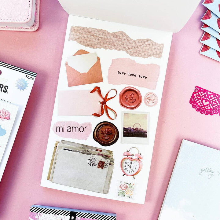 Example page of stickers with letter-related objects such as envelopes, wax seals and typewritten note.