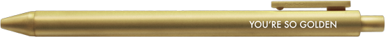 A gold-colored ballpoint pen with clip and clicker and white text.