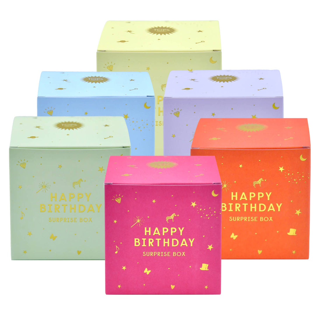 Different pastel colored boxes with gold lettering on each box along with various symbols.