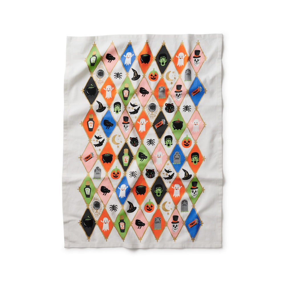 Tea towel with multi-colored argyle pattern, each diamond containing a Halloween object.
