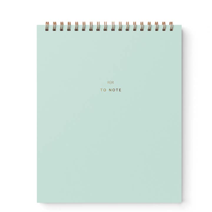 Cover of notebook in mint with gold wire binding at top.