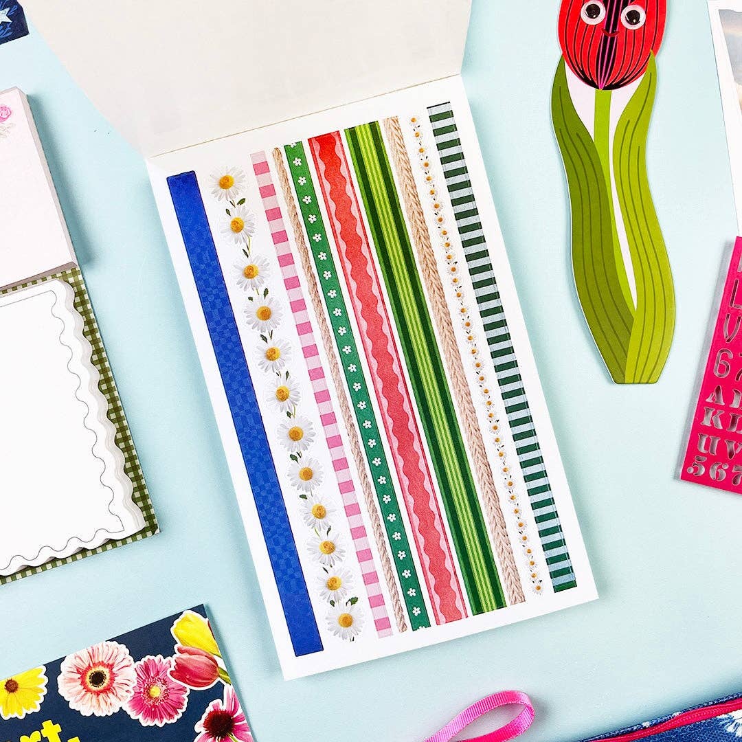 Sheet of decorative sticker strips with various patterns in a range of colors.