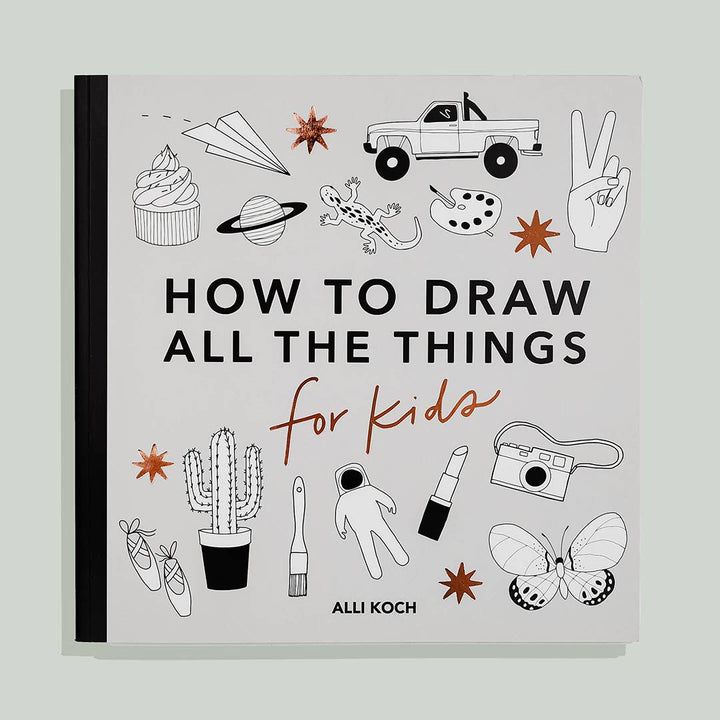 Book titled 'How to Draw All the Things for Kids' by Alii Koch featuring a light gray cover with over a dozen illustrations of various recognizable images, like a truck, cupcake, spacesuit.
