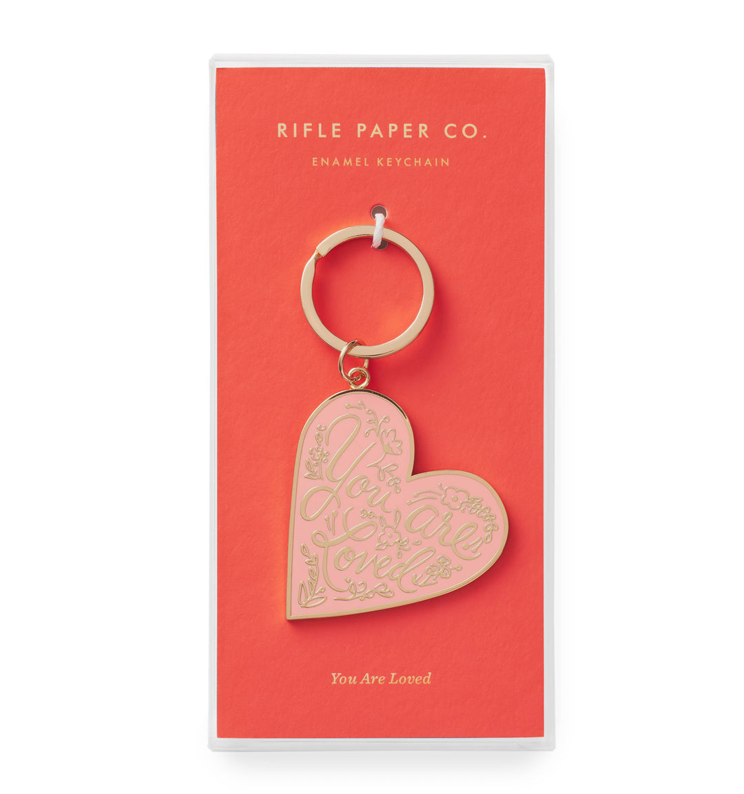 Pink heart-shaped keychain with 'You Are Loved' text in gold.
