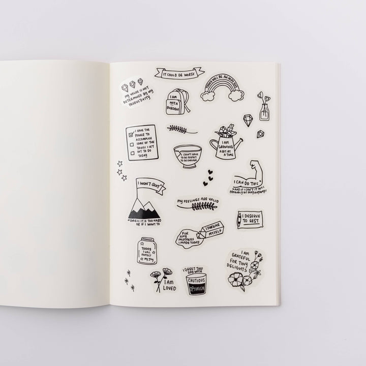 All the stickers on a notebook page.